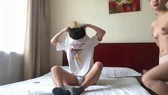 A Chinese Couple'S Hotel Room Encounter: An Intimate Moment