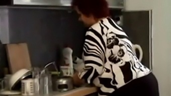 Voluptuous Granny Enjoys Passionate Encounter In The Culinary Realm